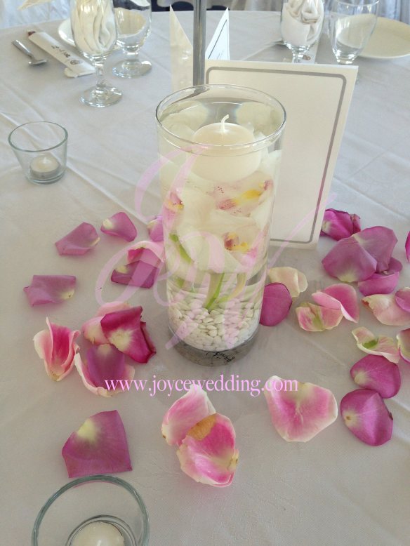 #submerge #centerpiece #folding candle #orchid #rose #petals