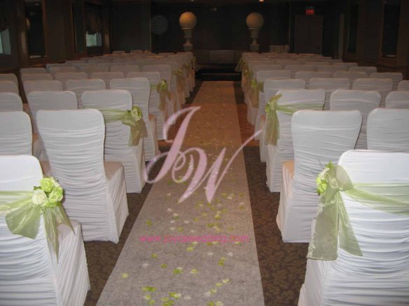 #stretch #chairs #green #ribbon #wedding #ceremony #walking #aisle #petals